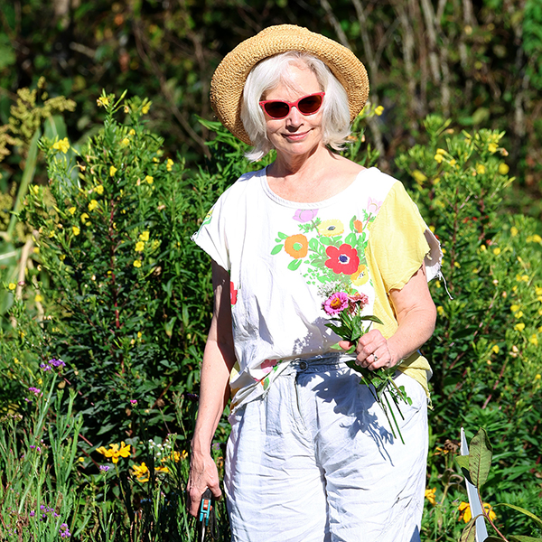 flowers-everywhere-person-in-garden-600px